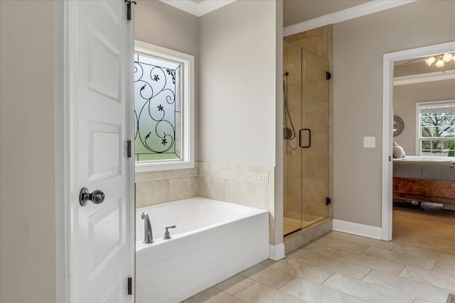 bathroom with tile patterned flooring, independent shower and bath, and ornamental molding