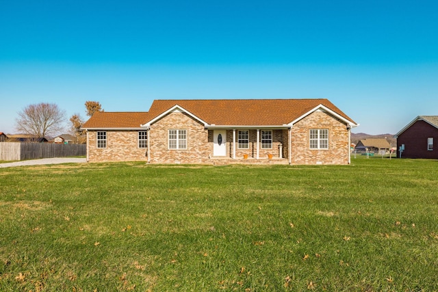 view of front of home with a front lawn