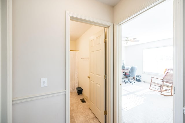 interior space featuring light tile patterned floors