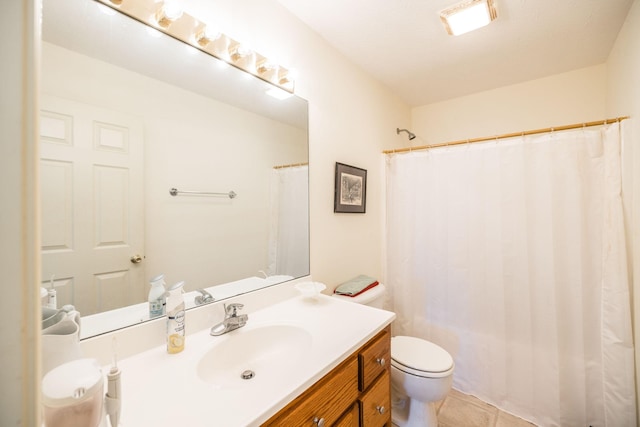 bathroom with tile patterned floors, vanity, curtained shower, and toilet