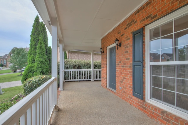 view of patio featuring a porch