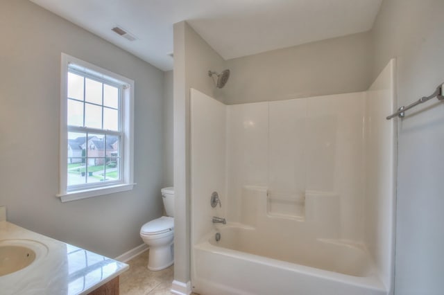 full bathroom with bathing tub / shower combination, tile patterned flooring, vanity, and toilet