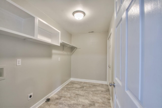 laundry room featuring electric dryer hookup