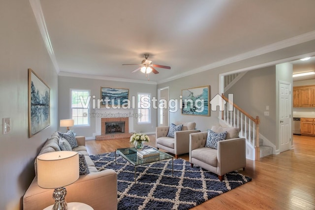 living room featuring ceiling fan, light wood-type flooring, and ornamental molding