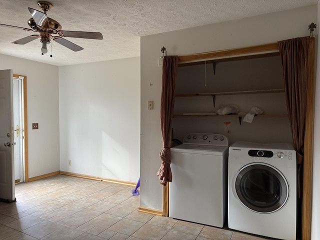 clothes washing area with independent washer and dryer, a textured ceiling, light tile patterned floors, and ceiling fan