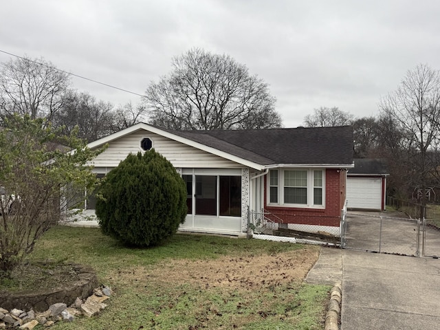 ranch-style house with a front lawn