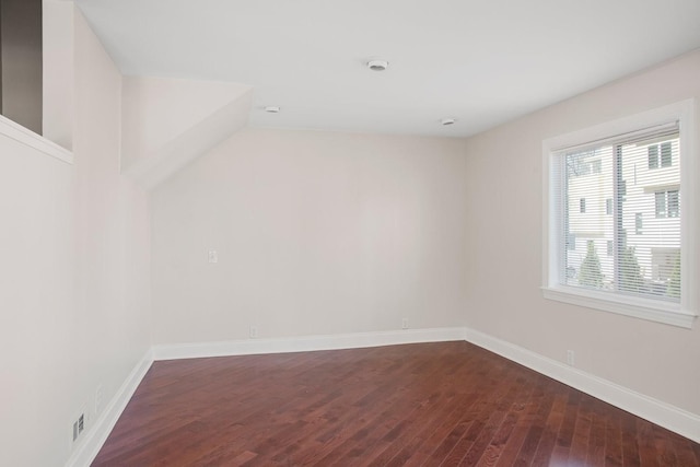 empty room with hardwood / wood-style floors