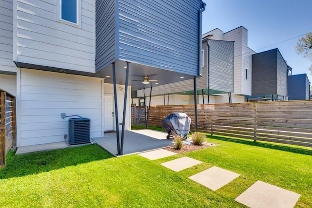 view of yard featuring a patio and cooling unit