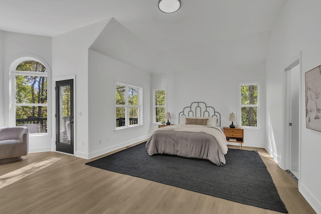 bedroom with hardwood / wood-style floors