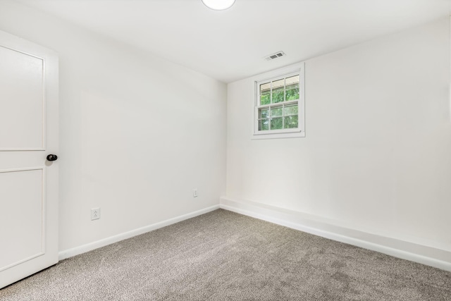 spare room with carpet