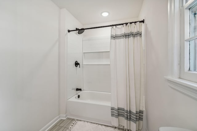 bathroom featuring shower / bath combo