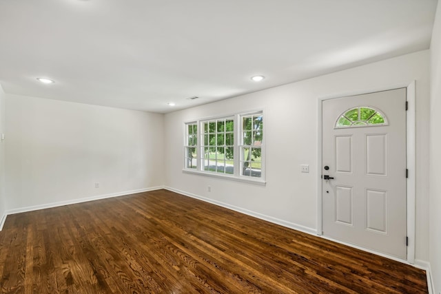 foyer entrance with dark hardwood / wood-style flooring