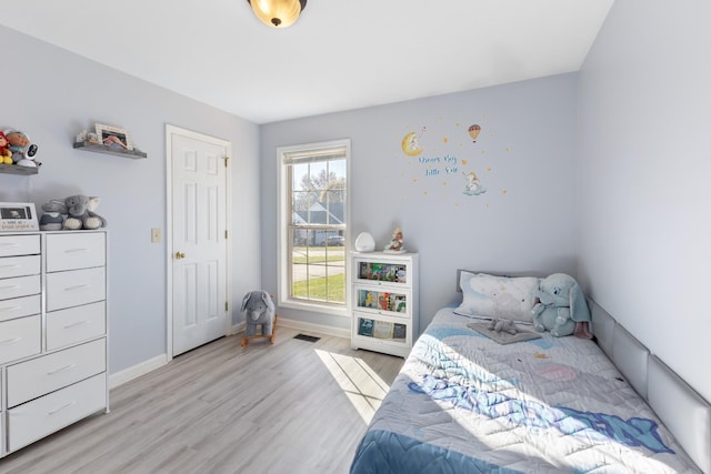 bedroom featuring light hardwood / wood-style floors