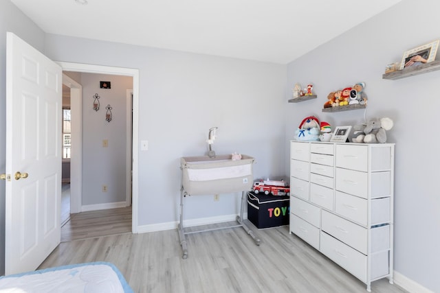 bedroom featuring light wood-type flooring