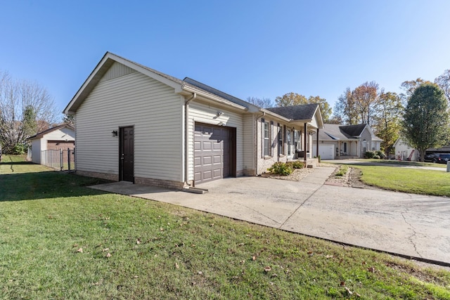 view of property exterior featuring a garage and a yard