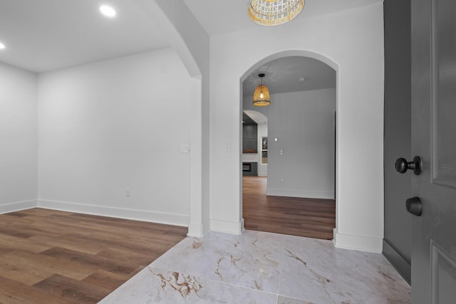 entryway with hardwood / wood-style flooring