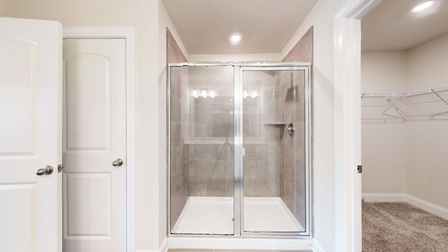 bathroom with an enclosed shower