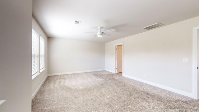 unfurnished room featuring carpet flooring and ceiling fan