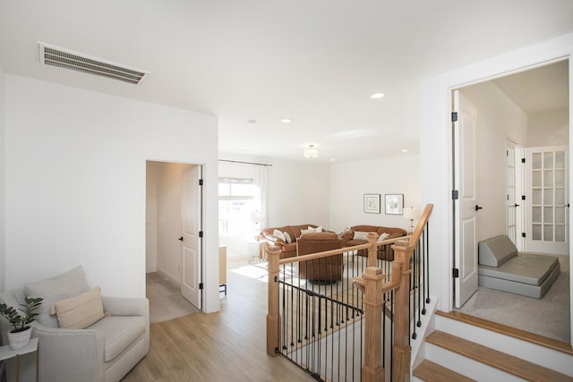 hallway featuring light hardwood / wood-style flooring