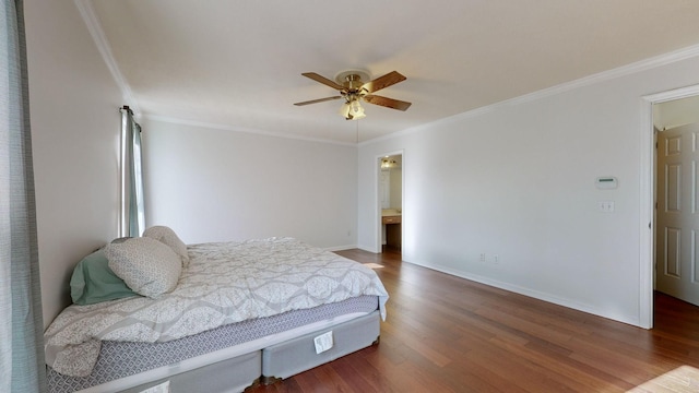 bedroom featuring hardwood / wood-style floors, ceiling fan, and ornamental molding