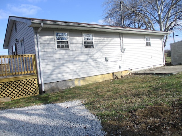 view of home's exterior with a deck