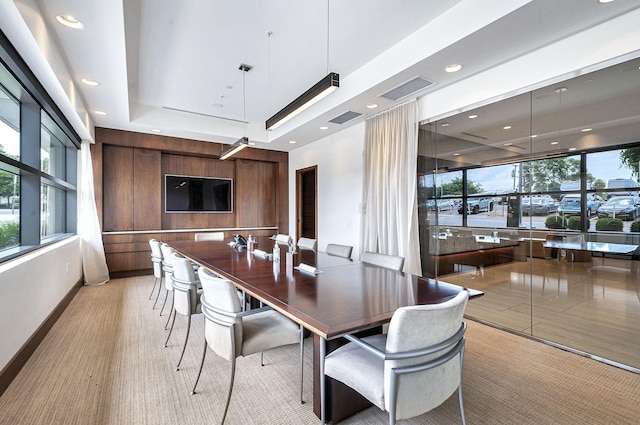 dining room with a tray ceiling