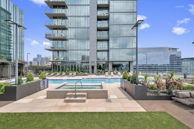 view of pool featuring a patio area