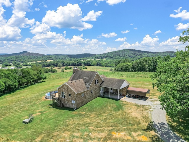 bird's eye view featuring a mountain view and a rural view