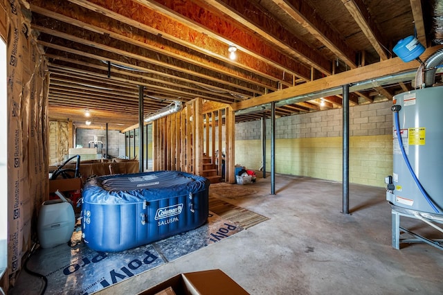 basement featuring gas water heater