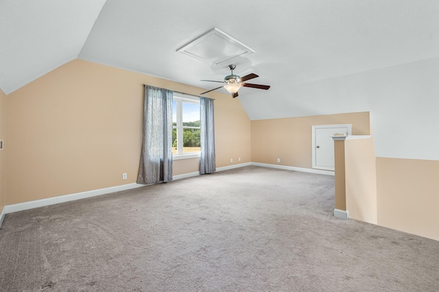 bonus room featuring carpet floors and lofted ceiling