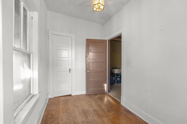 hallway featuring hardwood / wood-style floors