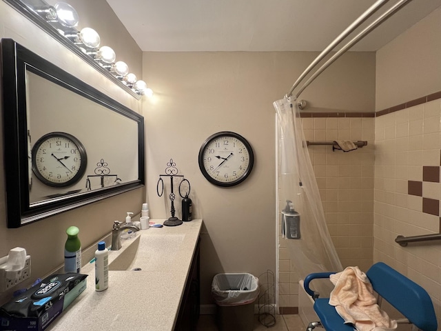 bathroom with vanity and a shower with shower curtain