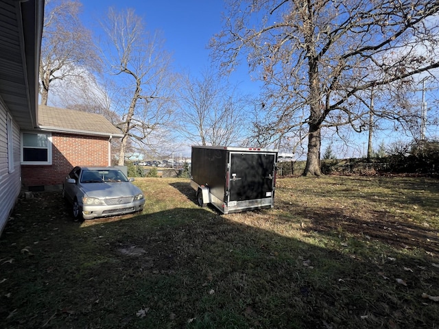 view of yard with a shed