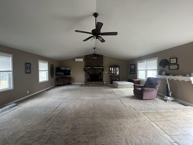 unfurnished living room featuring a fireplace, light colored carpet, ceiling fan, and lofted ceiling