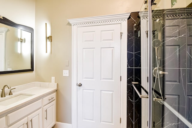 bathroom with vanity and an enclosed shower