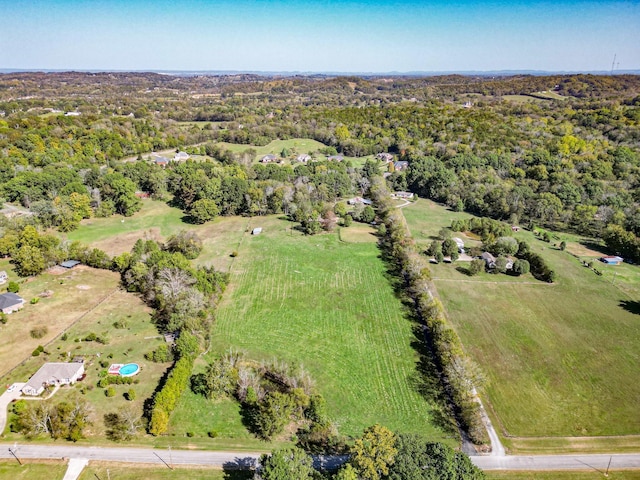 birds eye view of property featuring a rural view