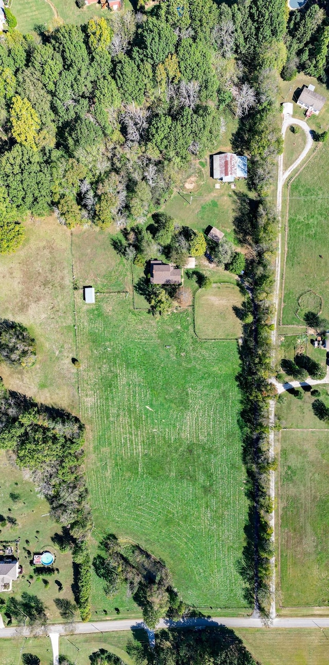 birds eye view of property featuring a rural view