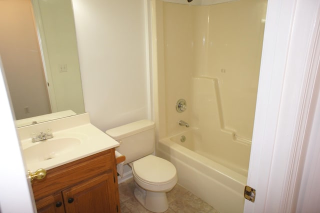 full bathroom featuring washtub / shower combination, vanity, and toilet