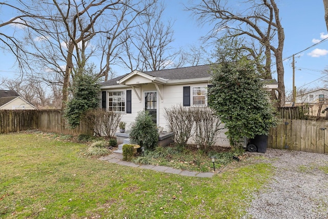 view of front of home with a front yard