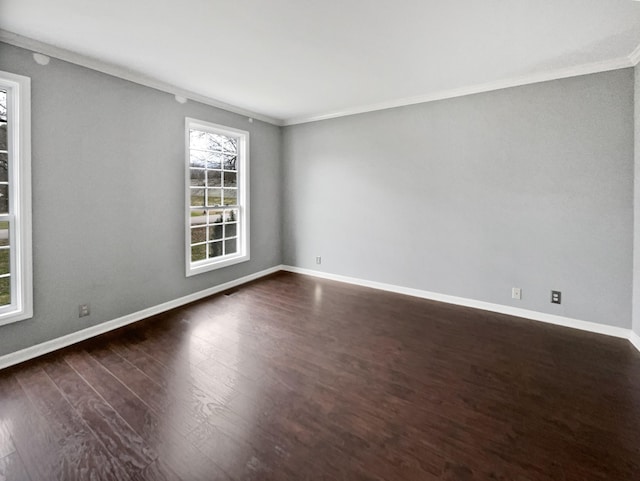 unfurnished room with dark wood-type flooring and ornamental molding