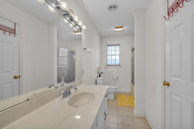 full bathroom featuring vanity, tile patterned floors, bath / shower combo with glass door, crown molding, and toilet