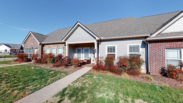 view of front of house with a front lawn