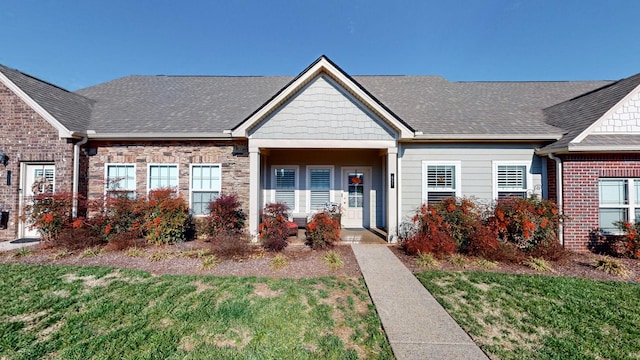 view of front of home with a front yard