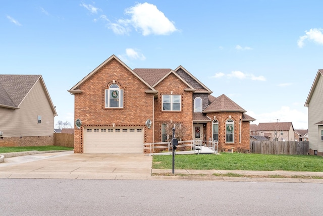 view of front property with a garage and a front lawn