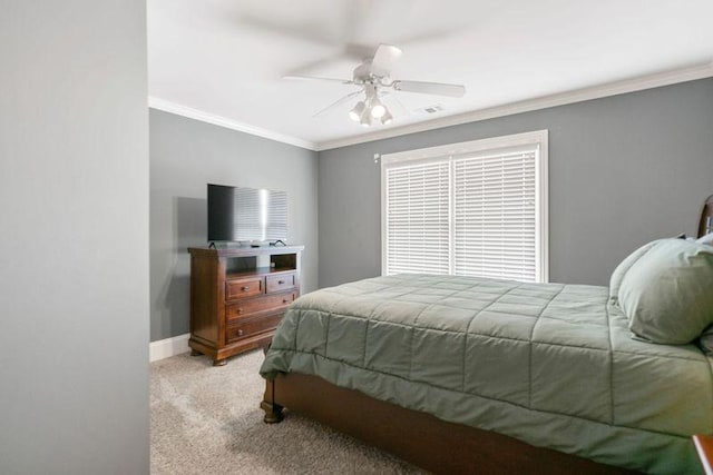 bedroom featuring light colored carpet, ceiling fan, and crown molding