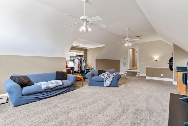 carpeted living room with ceiling fan and lofted ceiling