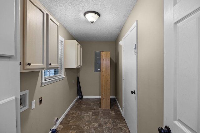 laundry room with electric dryer hookup, cabinets, electric panel, washer hookup, and a textured ceiling