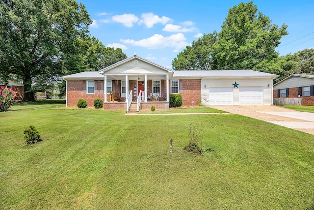 single story home featuring a porch, a garage, and a front yard