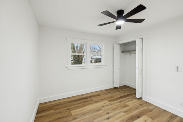 unfurnished bedroom with a closet, ceiling fan, and light hardwood / wood-style flooring