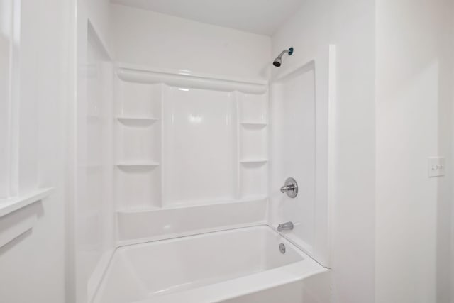 bathroom with shower / tub combination